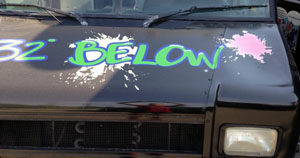 Fig 2: Fluorescent vinyl is not a good choice for graphics on the hood of a black truck